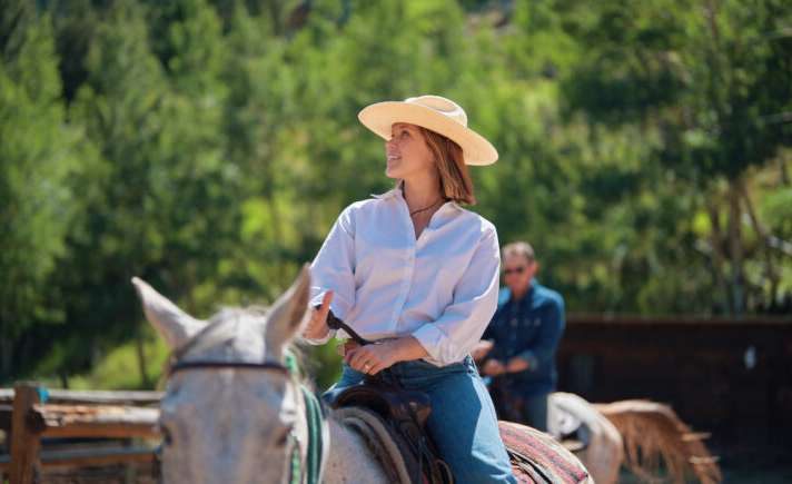Woman riding a horse
